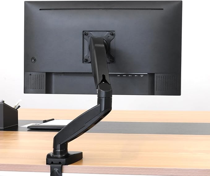 Amazon Basics Gas Spring Single Computer Monitor Arm Mount, Adjustable, Holds up to 27" Monitors, Black
